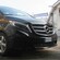The front end of a shiny new Mercedes van with tinted windows